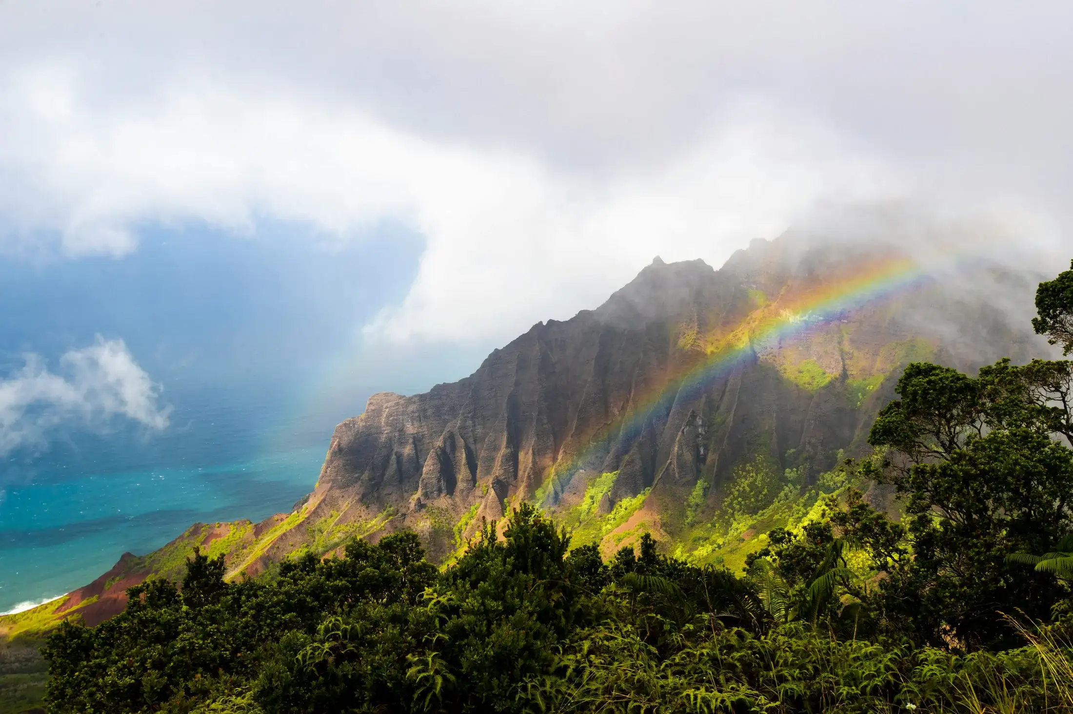 A rainbow over the Nā Pali cliffs, Kauaʻi